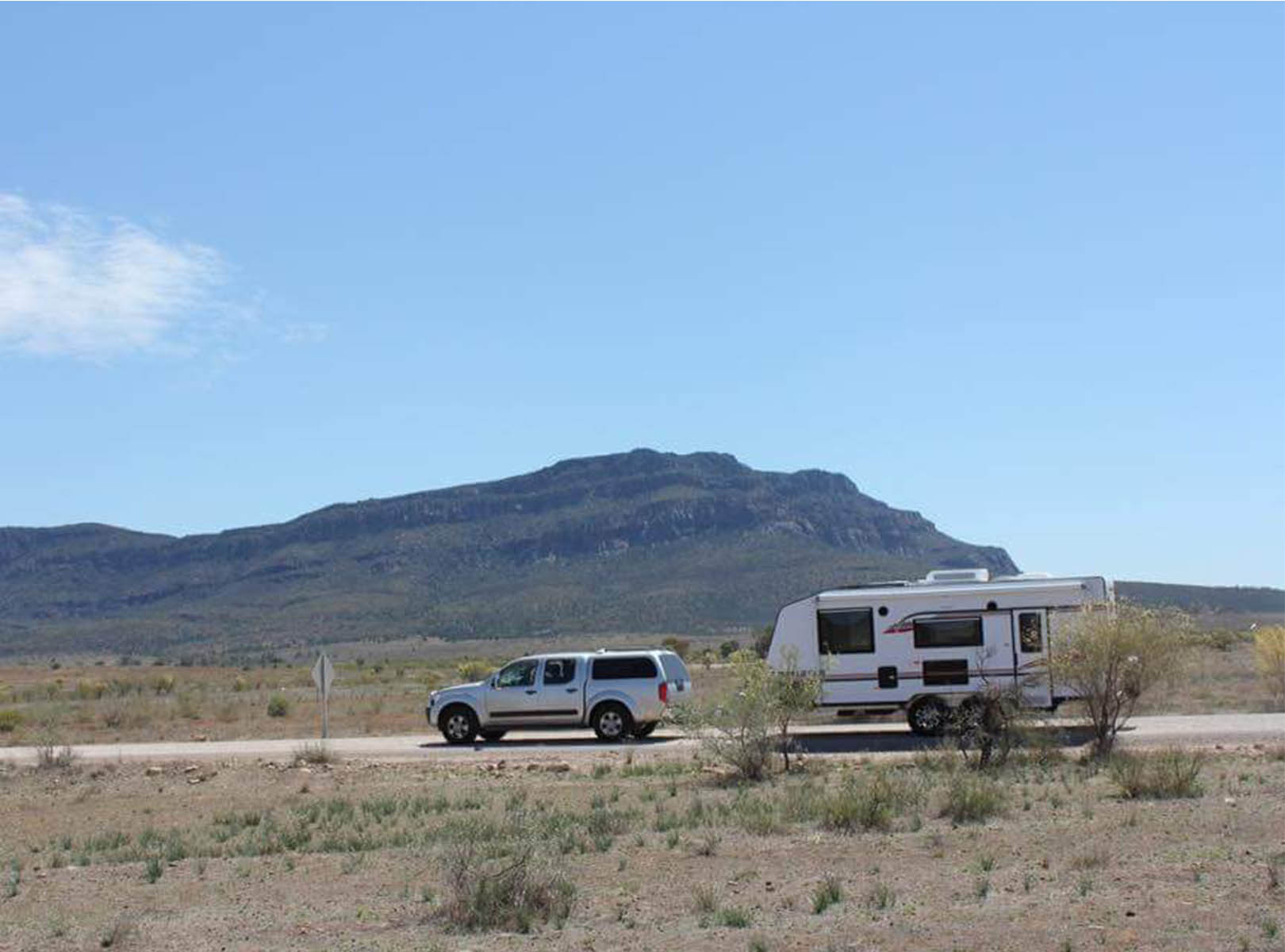 A 4x4 is towing a Newlands caravan